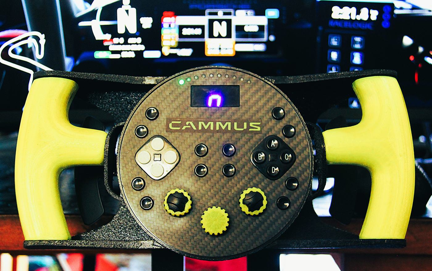 Front view: GT grips either side, the C5's carbon face and all its buttons in the middle