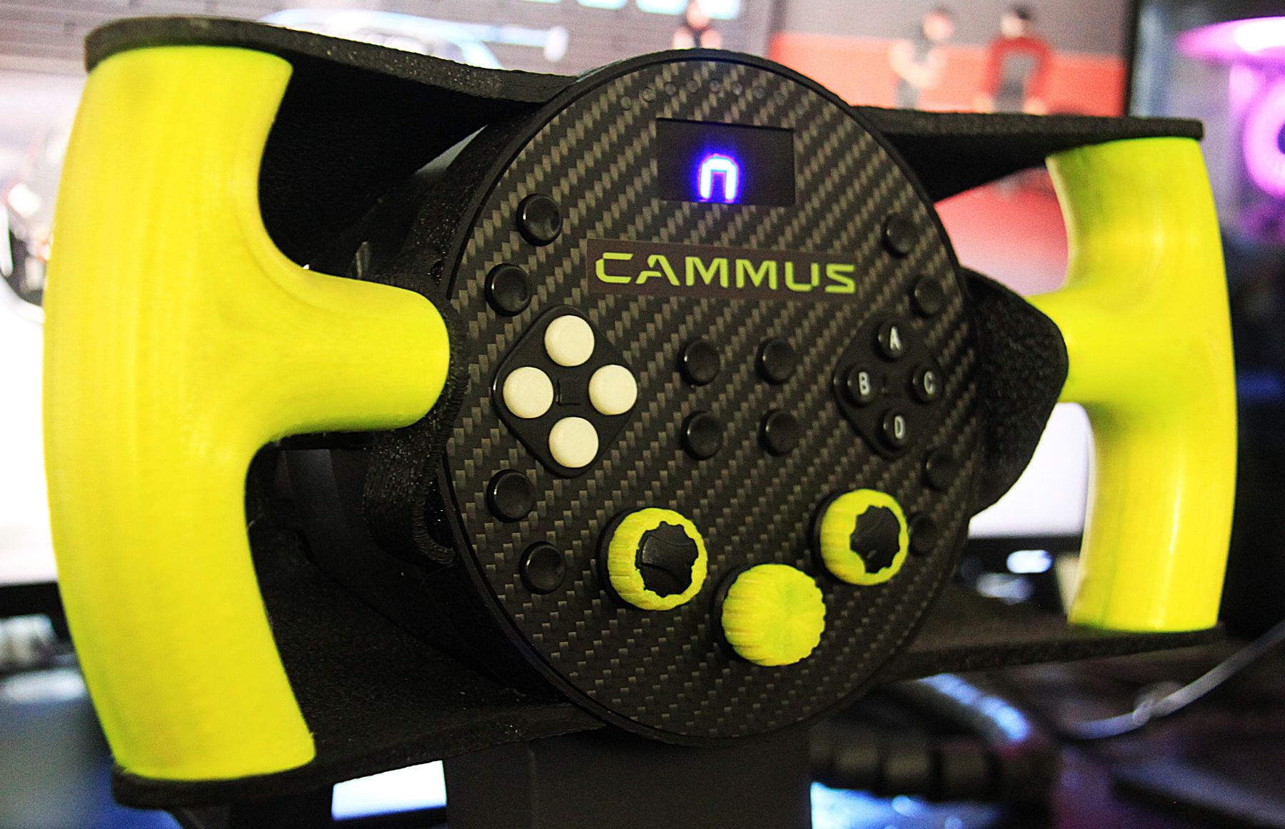 A CAMMUS C5 fitted with the GT conversion kit: black structure, lime grips, the original carbon face and buttons in the middle